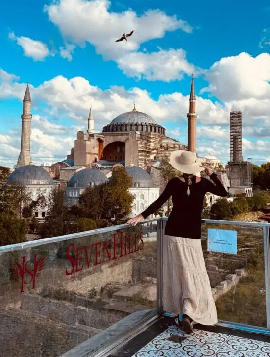 Woman admiring Hagia Sophia in Istanbul.